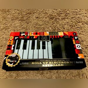 FAO Schwarz roll up electric keyboard